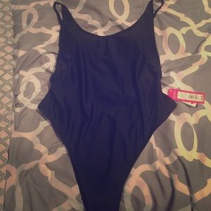 Black Xhilaration one piece